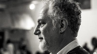 'When I returned to Lebanon as an adult, what I witnessed resembled a scene from Mad Max - a world of chaos where everyone had a gun,' photojournalist George Azar says [Bilal Tarabey/Al Jazeera]