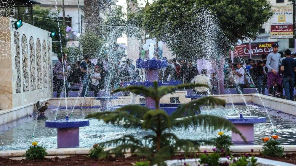 Fountains were painted in purple and the clock tower was restored [Violet Organization/Al Jazeera]
