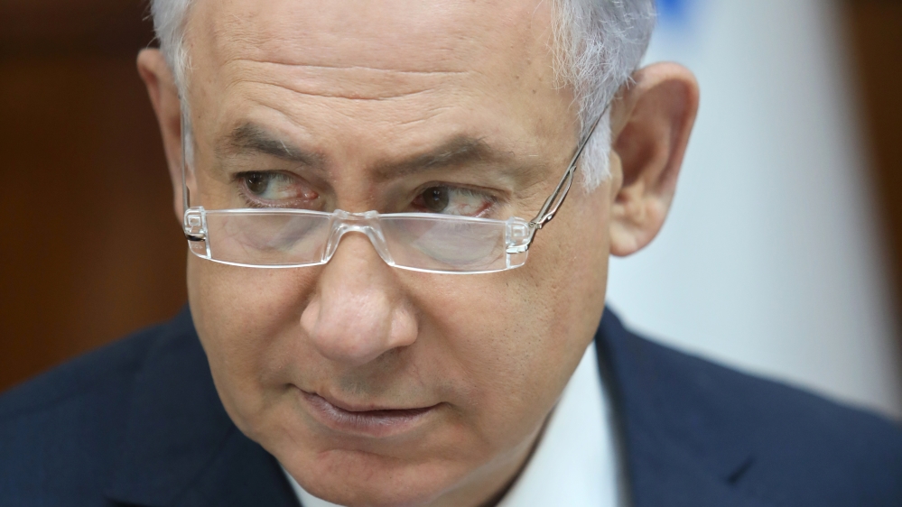 If Netanyahu is indicted, he will almost certainly have to step down [Dan Balilty/Reuters]