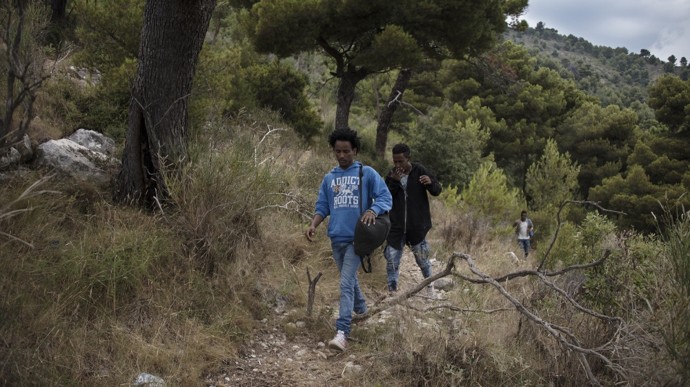 Birhan and Awate lead the group to the summit [Maurizio Martorana/Al Jazeera]