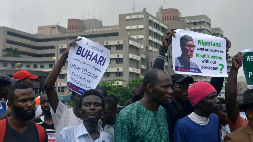 Supporters of the Our mumu don do movement attend a protest demanding that President Muhammadu Buhari resume or resign, in Abuja