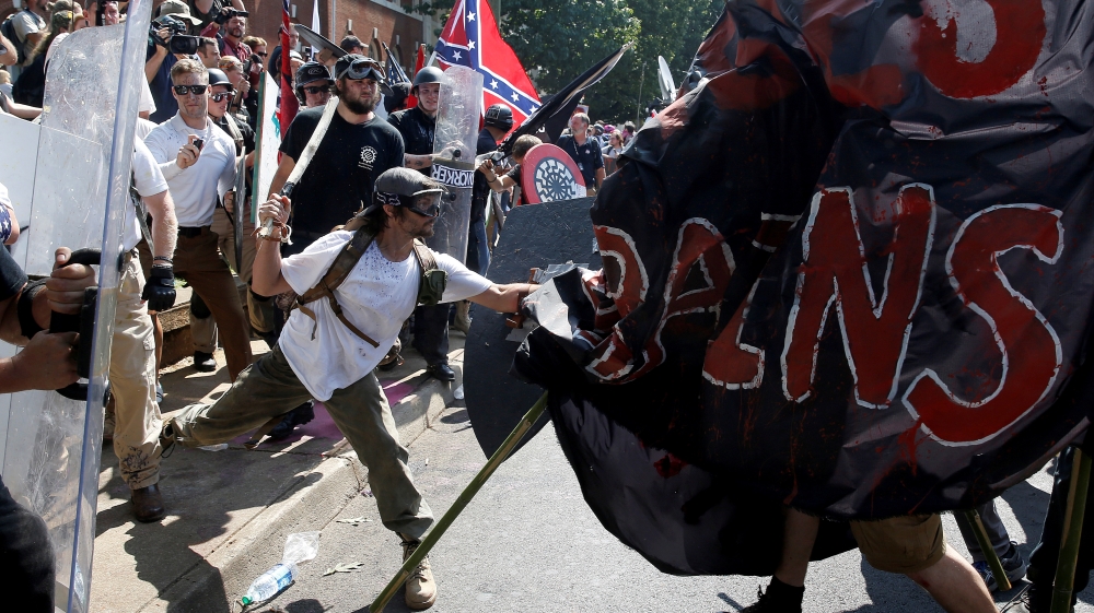 White supremacists clash with counter protesters at a rally in Charlottesville, Virginia