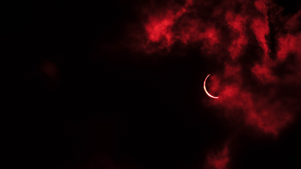 Not everyone was so lucky as the clouds didn’t clear in some areas [Karim Haddad/Al Jazeera]