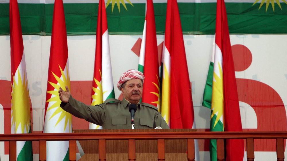 Iraqi Kurdish president Barzani salutes the crowd while attending a rally that shows the support for the upcoming September 25th independence referendum in Erbil