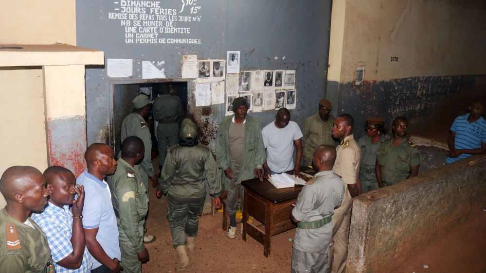 Security forces stand during the release of Anglophone activists at the prison of Yaounde,Cameroon,