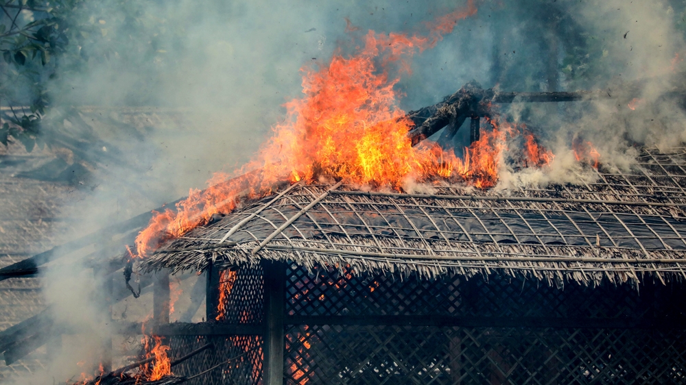 Myanmar: A house is consumed by fire in Gawdu Tharya village near Maungdaw in Rakhine state