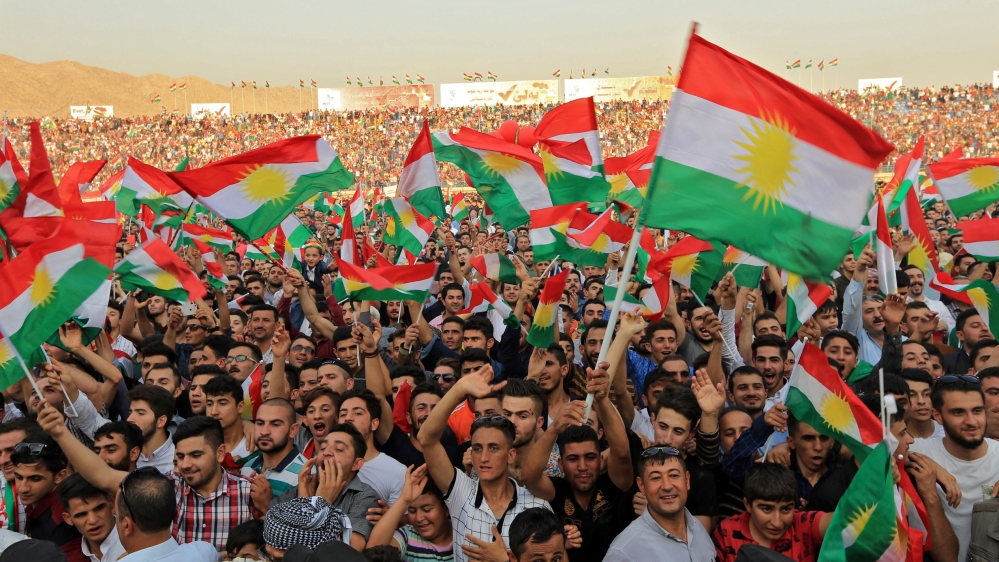 Kurdish people attend a rally to show their support for the upcoming September 25th independence referendum in Duhuk