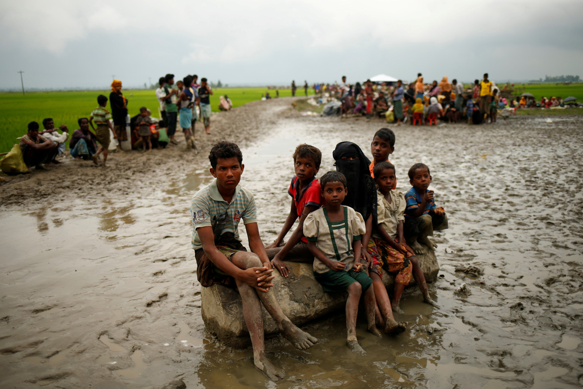 Rohingya Muslims fleeing violence.