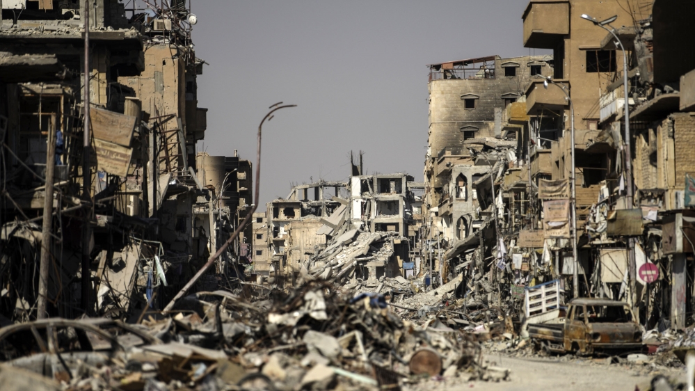 Heavily damaged buildings in Raqqa, after a Kurdish-led force expelled ISIL from the northern Syrian city. [Bulent Kilic/AFP/Getty Images]