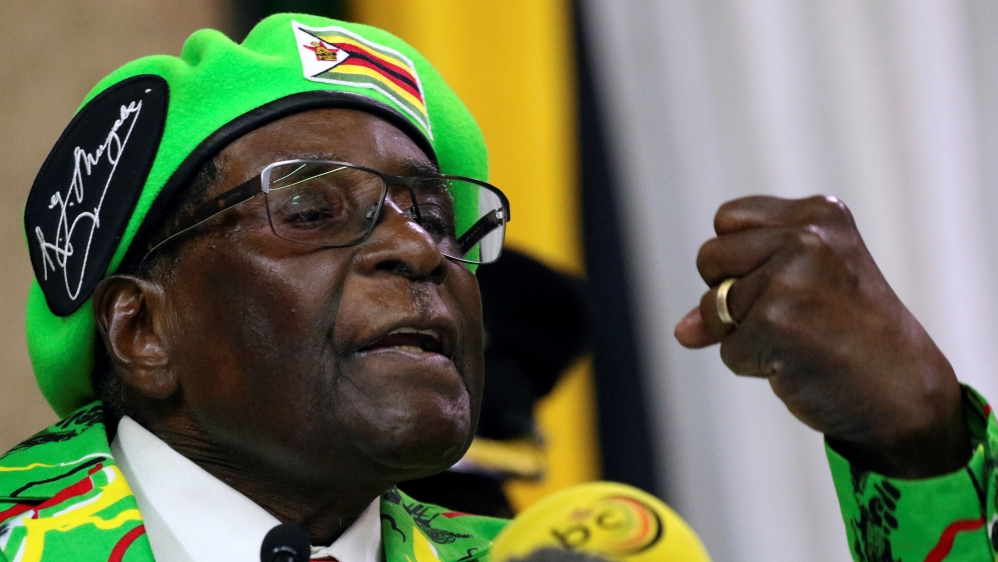 Zimbabwean President Robert Mugabe addresses a meeting of his ruling ZANU PF party''s youth league in Harare
