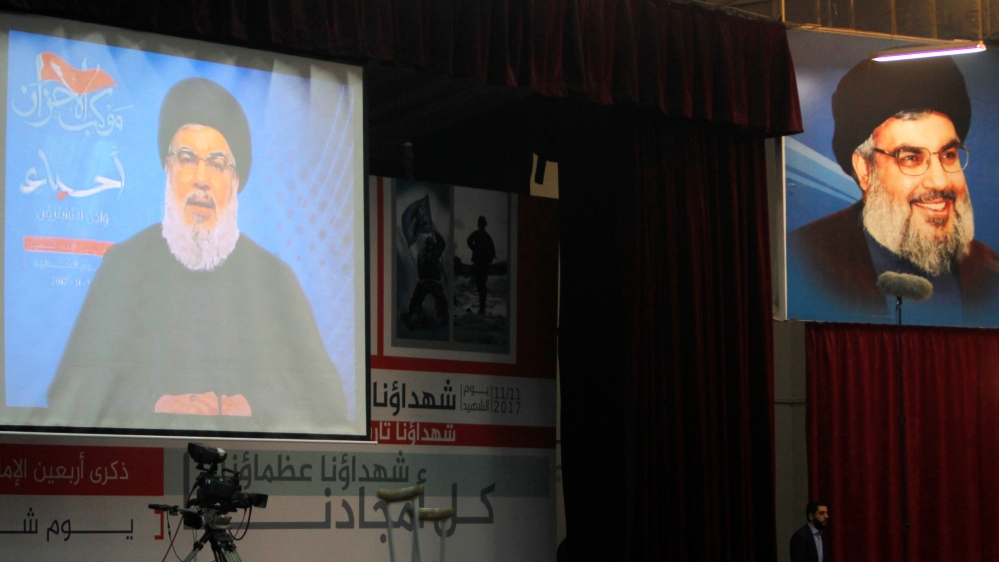 Lebanon''s Hezbollah leader Sayyed Hassan Nasrallah is seen on a video screen as he addresses his supporters in Beirut