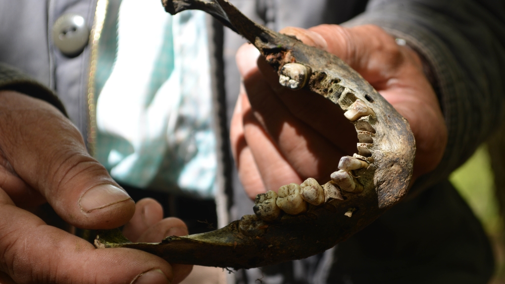 Years ago, Nukic found some of the remains of his father's body [Mersiha Gadzo/Al Jazeera]