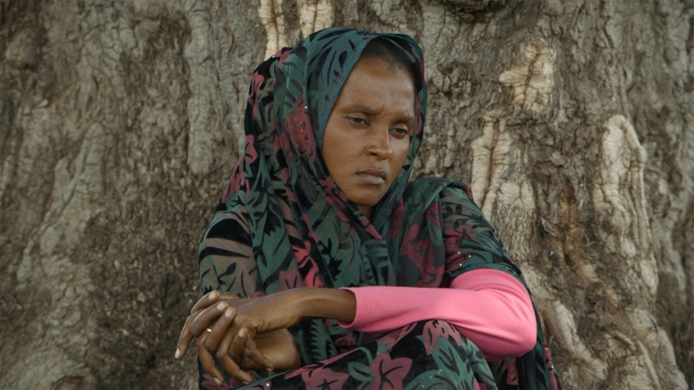 
Amzine got pregnant when she was repeatedly raped as rebels from the DRC rampaged through CAR in 2002 and 2003 [Screengrab/Al Jazeera]
