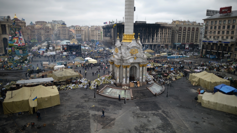 Arrest Warrant Issued For Former Ukrainian Leader As Square Becomes Shrine To Dead