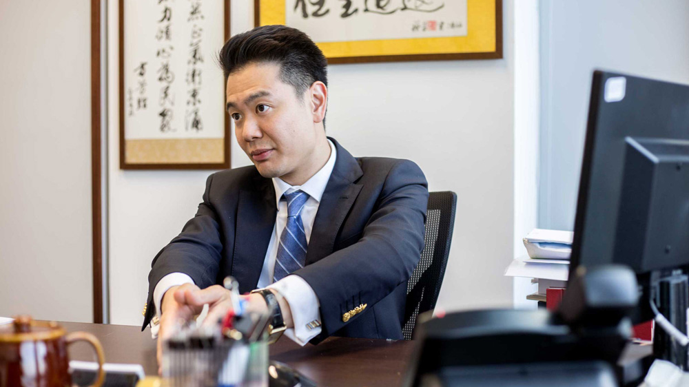 Pro-establishment politician Holden Chow says booing the anthem at football matches is disrespectful [Jeremy Smart/Al Jazeera]