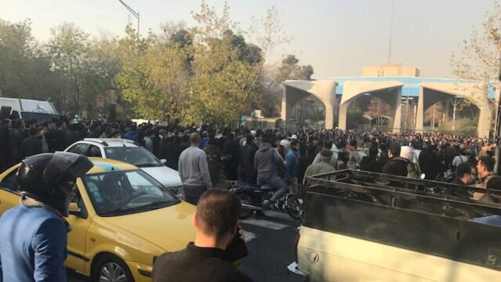 People protest near the university of Tehran