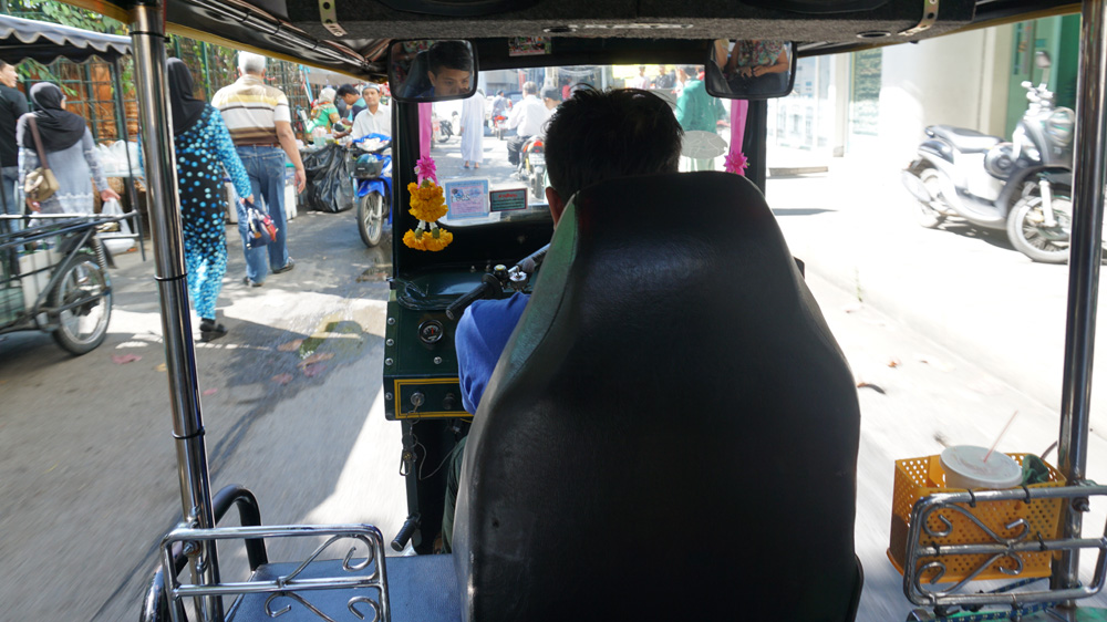 Now Krit teaches teen boys - also sex-trafficking victims - to drive the noisy three-wheel taxis [Clare Wiley/Al Jazeera]