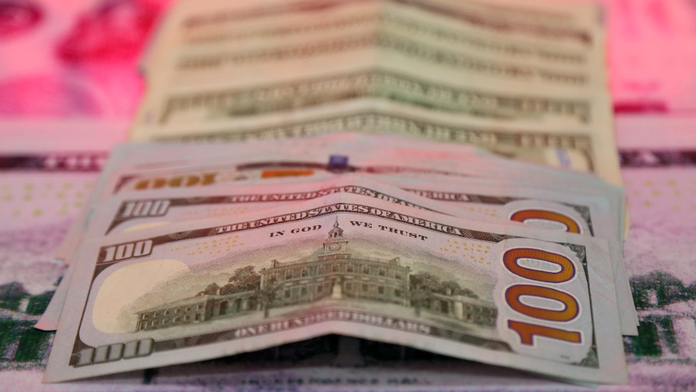 U.S. dollar banknotes are pictured at a currency exchange office in Diyarbakir