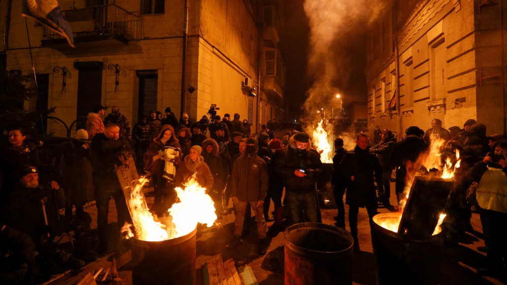 Saakashvili supporters gathered outside the detention facility where the opposition leader was taken [Valentyn Ogirenko/Reuters]
