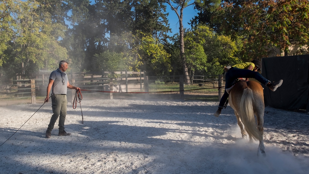 'Of course you can get something from horses, but before all of that, it is a tool to make a relationship with these children' [Fahrinisa Oswald/Al Jazeera]