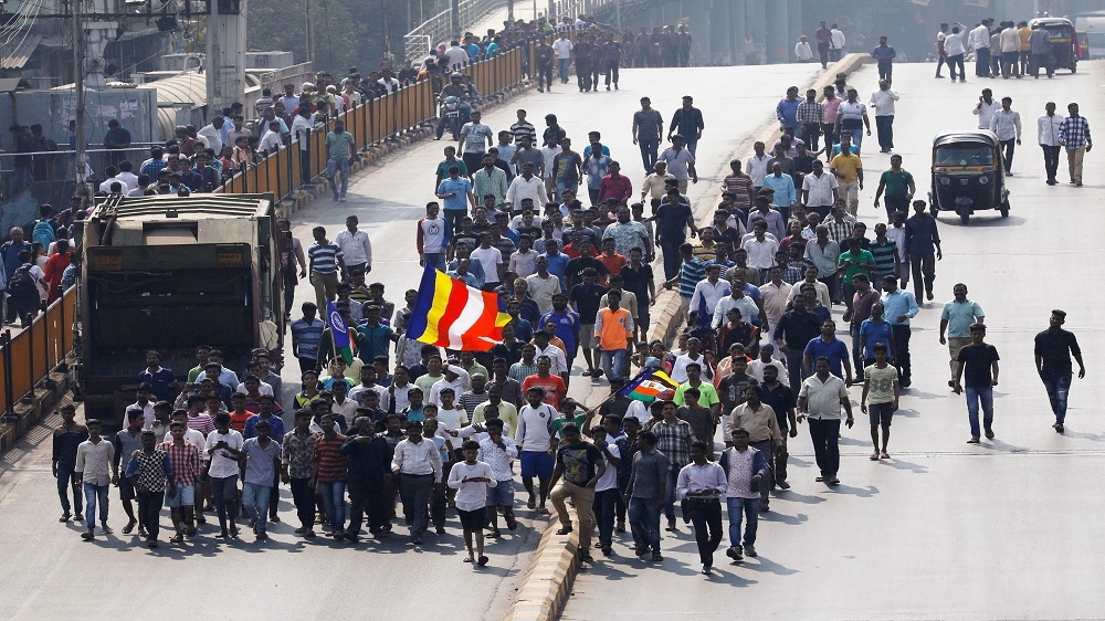Demonstrators stopped trains and took to the streets to mark the 200th anniversary of the battle of Bhima-Koregaon [Reuters/Danish Siddiqui]