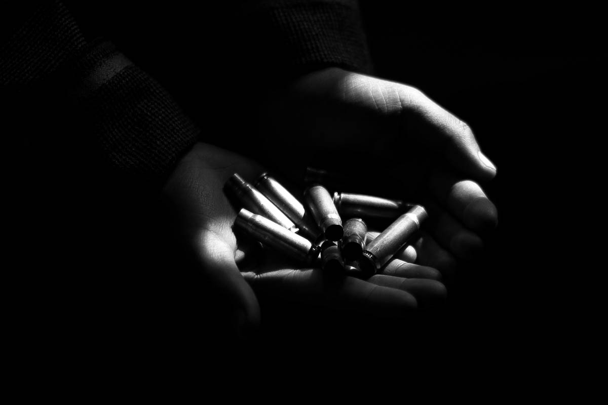 A child shows cartridges of bullets he has collected at gunfight site at village Chaigund on Jan. 25, 2018 in Shopian district, about 48 km south of Srinagar city, the summer capital of Indian-contr