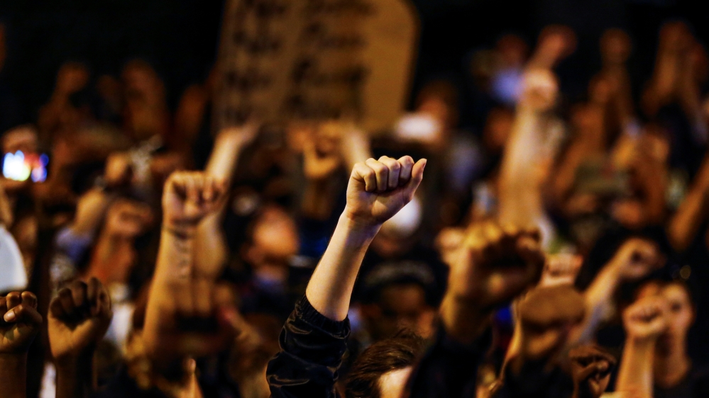 Amnesty op-ed protest REUTERS/Jason Miczek