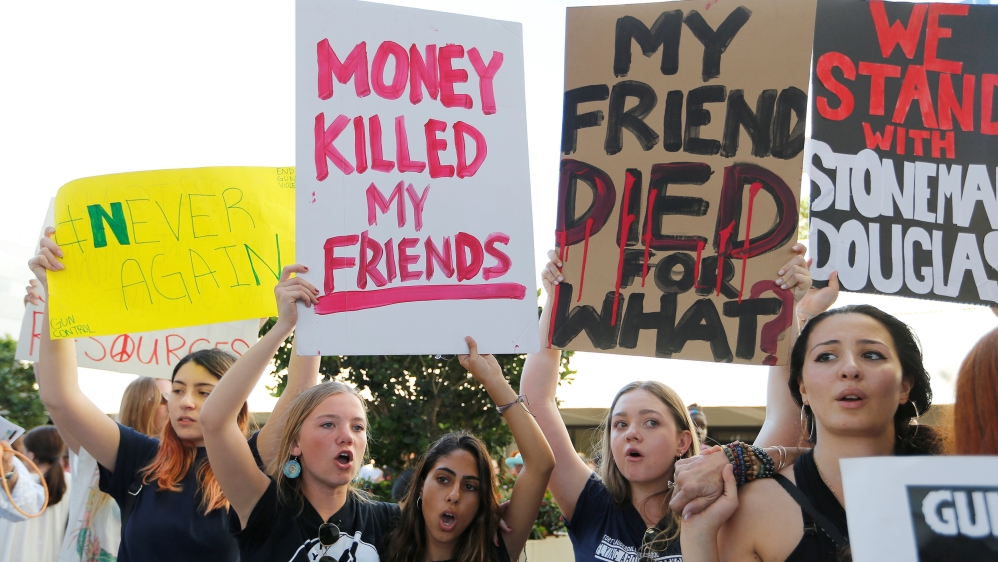 Demonstrators attend the March for Action on Gun Violence in Broward County at the U.S. Courthouse in Fort Lauderdale