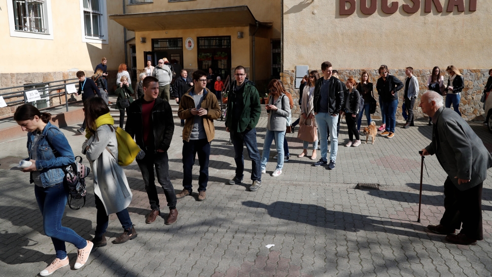Voting officially ended at 7pm (17:00 GMT) [Bernadett Szabo/Reuters]