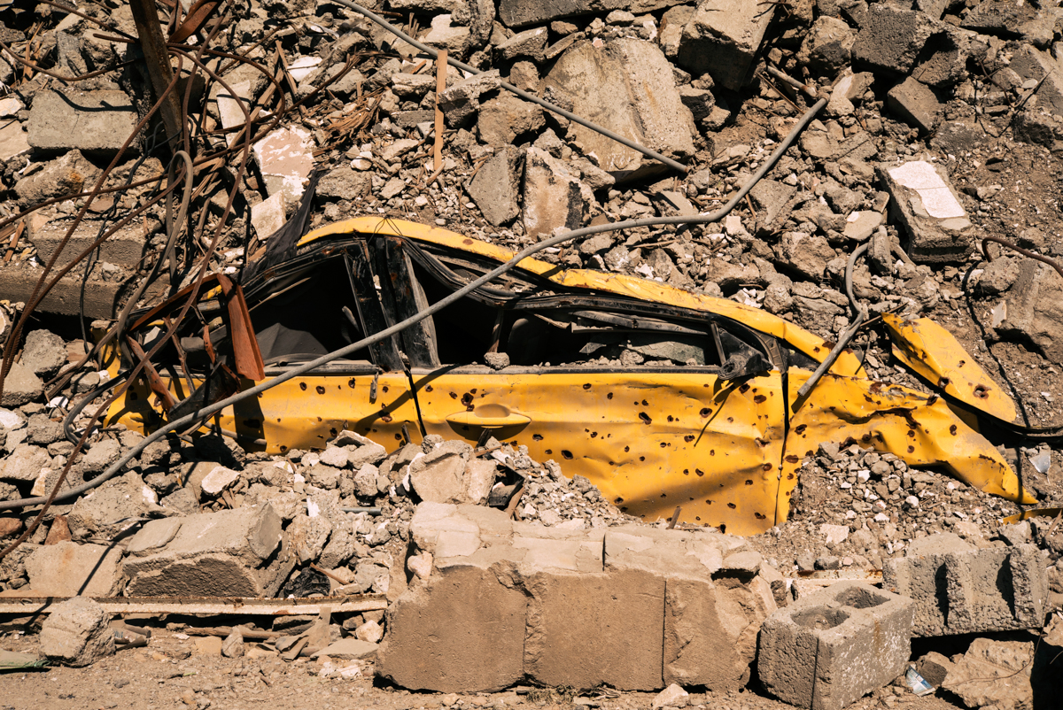 In Mosul old town most of the buildings were destroyed by mortars or airstrikes. A car got trapped under a fallen building.