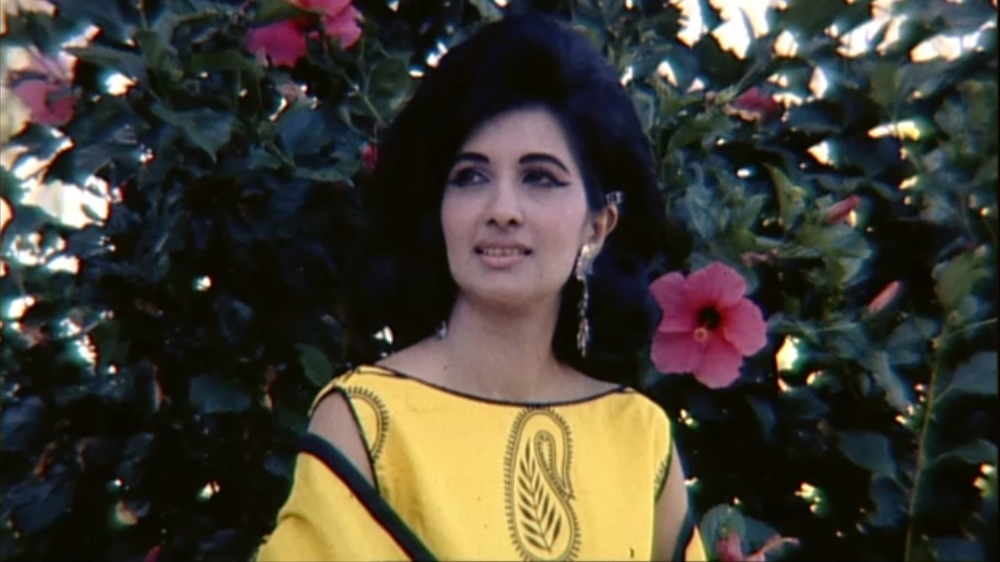 Dolly Khaki was a model when she met the young photographer in Dar es Salaam [Screengrab/Al Jazeera] 