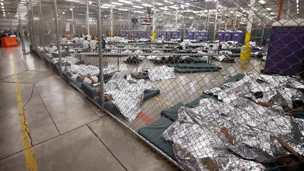Immigrant children in cages Obama2014 Reuters