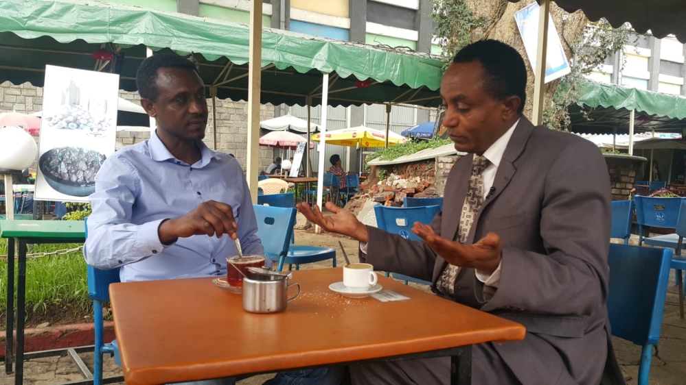 Yonas Abraham (r) and his brother Bereket in Addis Ababa [Mohammed/Al Jazeera] [Al Jazeera]