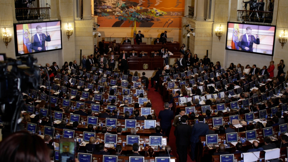 Santos urges the nation to protect the nascent peace [Juan Pablo Pino/Reuters]