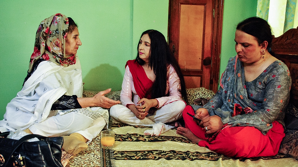 Maria Khan's friends help her plan and supporting her campaign [Saba Rehman/Al Jazeera]