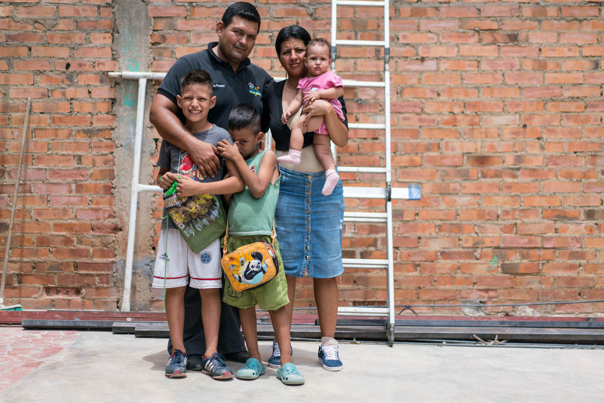 Sofia* and Luis* fled Venezuela with their two sons and baby girl. They both used to work in transportation and are now finding odd jobs including cutting hair to earn enough money to feed their famil