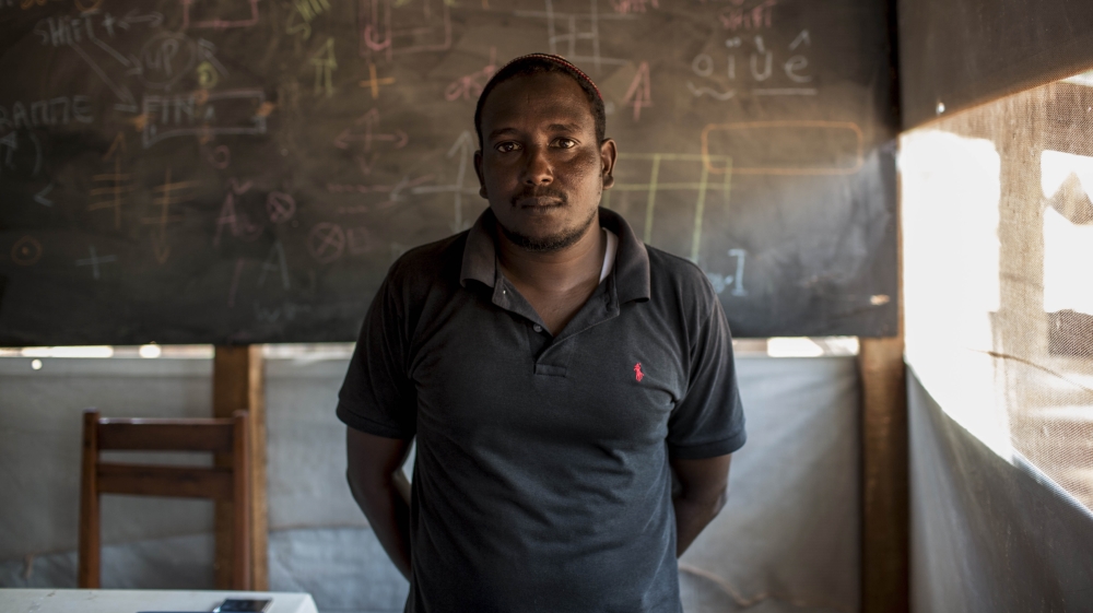
Djamaladine Mahamat Salet inside the computer lab he opened [Will Baxter/Al Jazeera]
