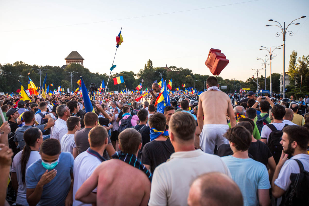 A protester threw a road block at the gendarmes. The protest was mainly peacefull for hours, except for localized incidents, to which the police responded with tear gas. [Alexandra Radu/Al Jazeera]