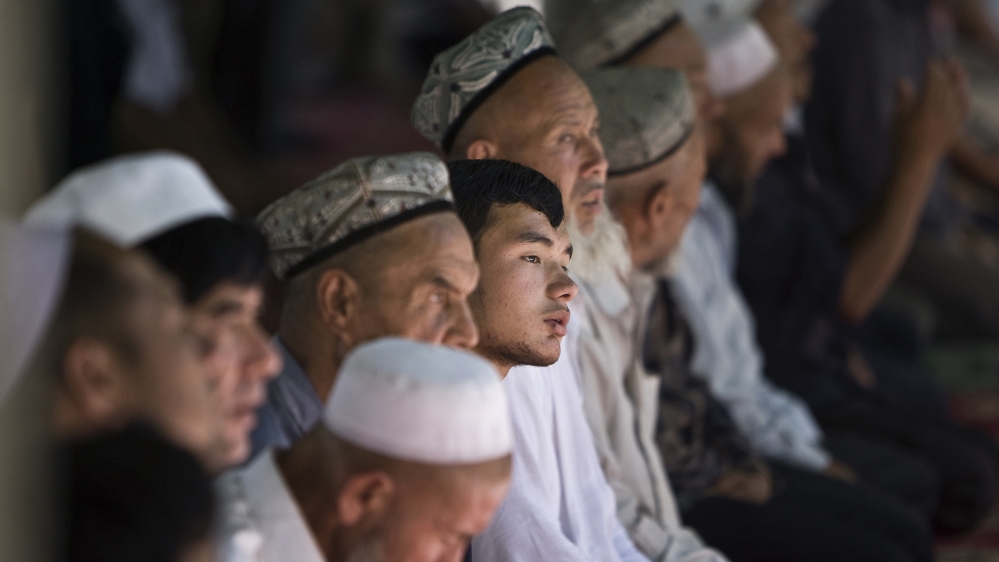 Uighur man pray