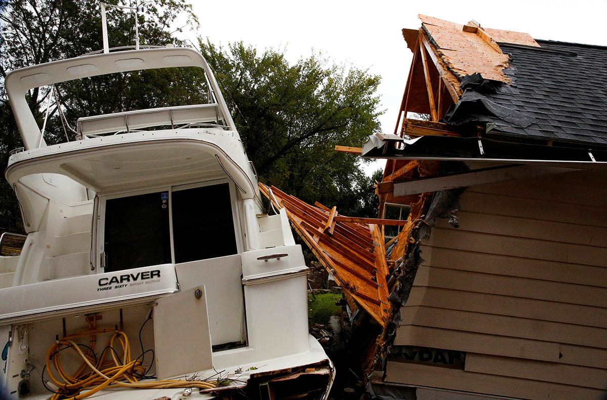 A boat sits in a backyard after the passing of Hurricane Florence in New Bern, North Carolina, U.S., September 16, 2018. REUTERS/Eduardo Munoz TPX IMAGES OF THE DAY