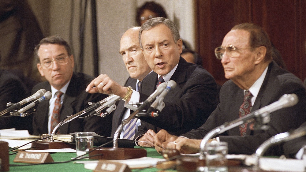 Senator Orrin Hatch questions Professor Anita Hill during a Senate Judiciary Committee hearing on the nomination of Clarence Thomas [File: John Duricka/AP Photo] 