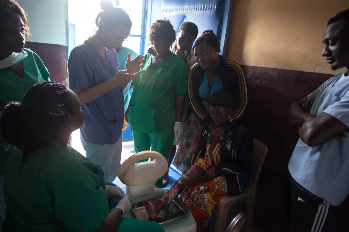 Marie, a French intern in Cameroon for 5 months, speaks to Dr.Geri-Trial on WhatsApp, during a video consultation. The Wound Hospital of Balaveng was founded by