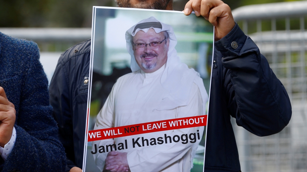 A demonstrator holds picture of Saudi journalist Jamal Khashoggi during a protest in front of Saudi Arabia''s consulate in Istanbul