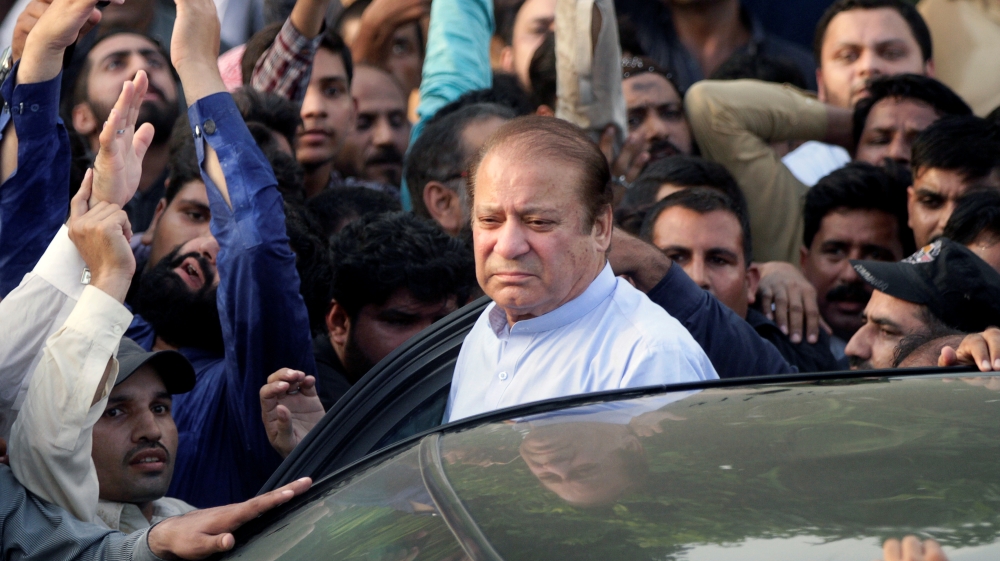 Former Prime Minister Nawaz Sharif arrives to attend funeral services for his wife, Kulsoom, in Lahore