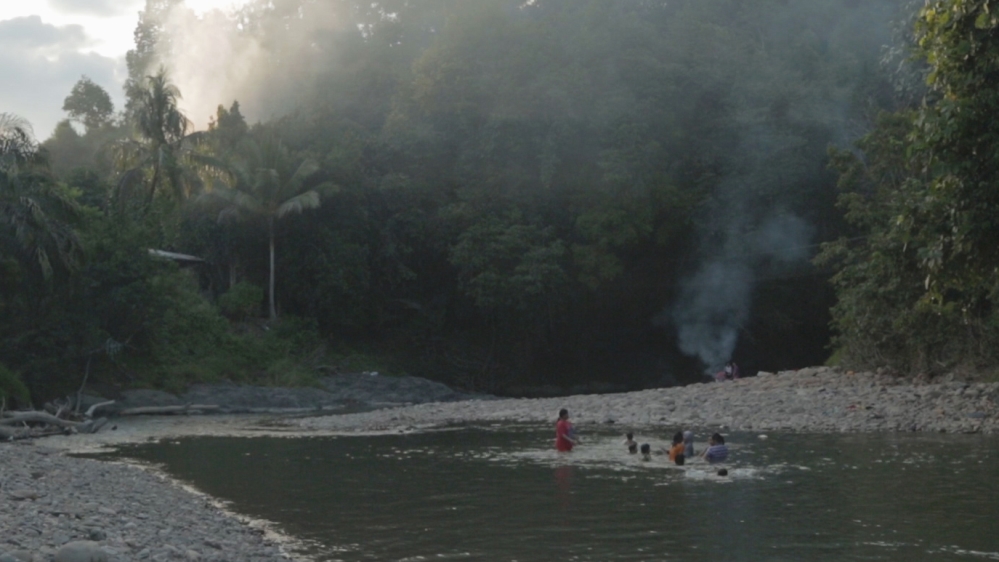 There is still time to swim in the river [Vincent Gonneville/Al Jazeera]