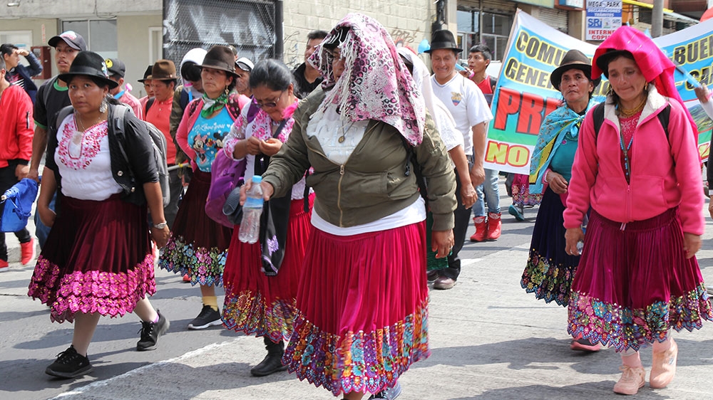 Hundreds of protesters joined the dozens who marched more than 600km to Quito [Kimberley Brown/Al Jazeera]