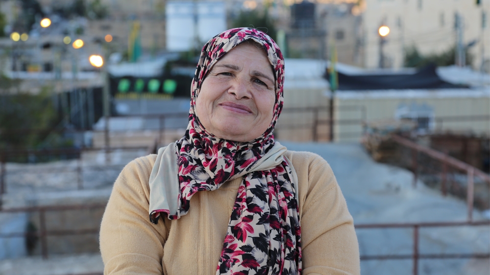 'We will not be able to use some of the windows [in the women's centre] because it's right in front of the settlement,' Zleikha Muhtaseb said [Mersiha Gadzo/Al Jazeera]