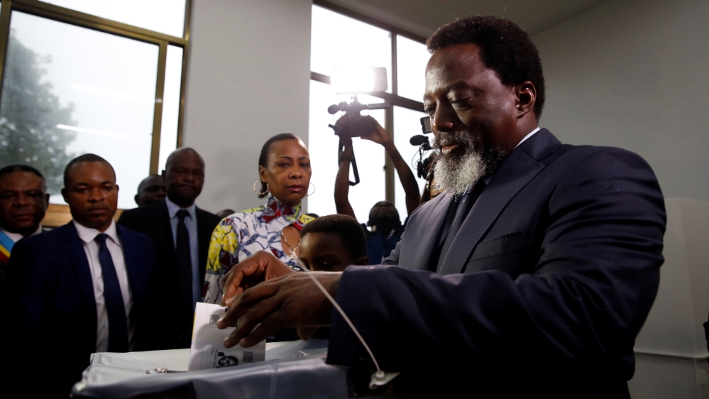 Democratic Republic of Congo's President Joseph Kabila casts his vote at a polling station in Kinshasa [Baz Ratner/Reuters]