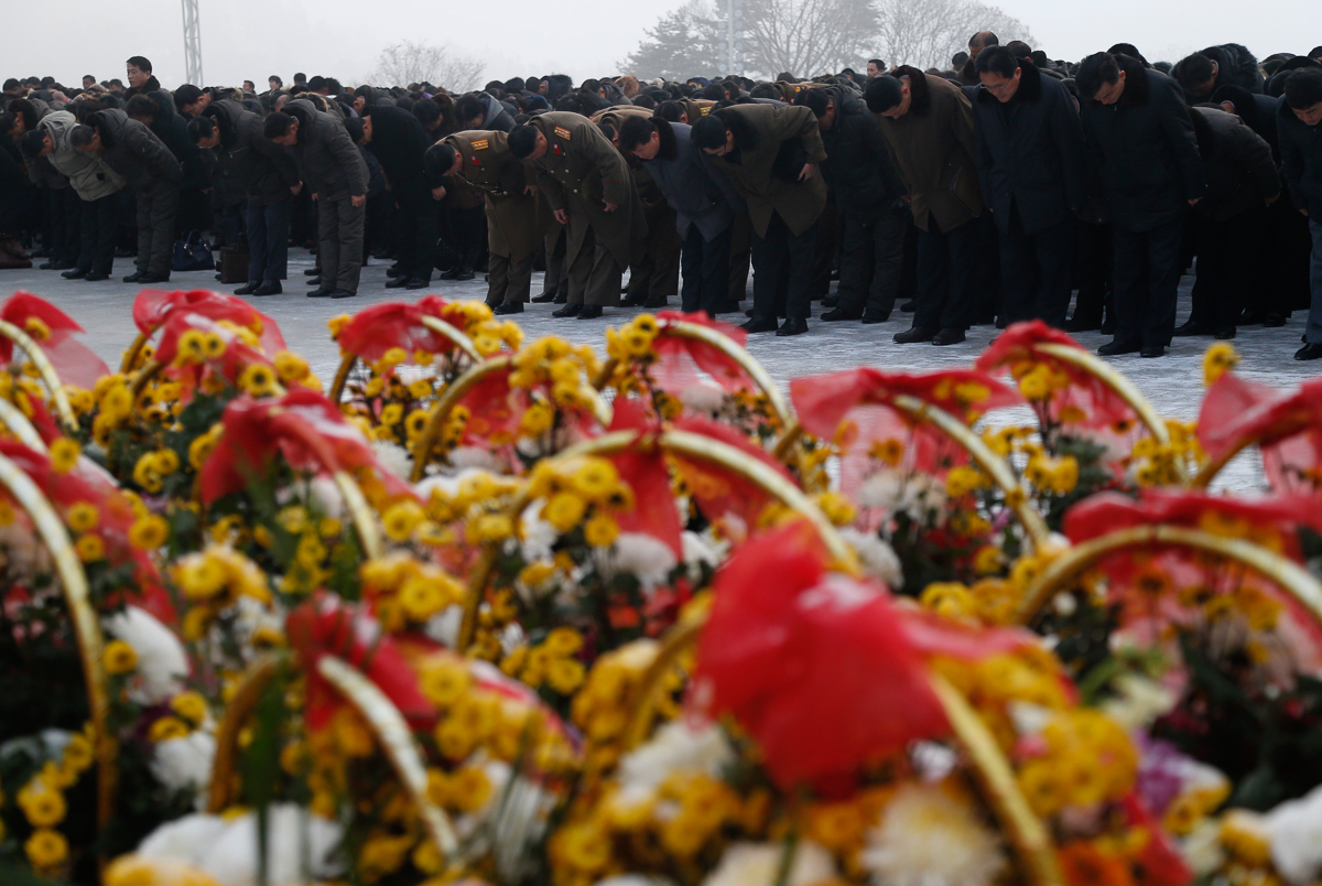 North Koreans bow at the bronze statues of their late leaders Kim Il Sung and Kim Jong Il at Mansu Hill Grand Monument in Pyongyang, North Korea, Monday, Dec. 17, 2018. North Koreans are marking the s