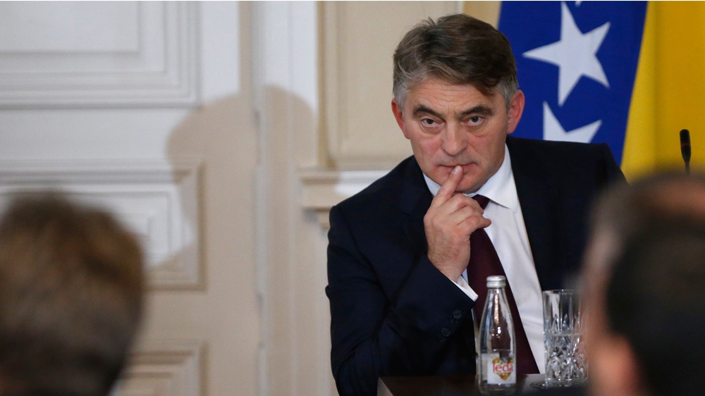 Newly elected Croat member of Bosnia's presidency Zeljko Komsic, a moderate, is viewed by hardliners as not being Croat enough [Amel Emric/AP]